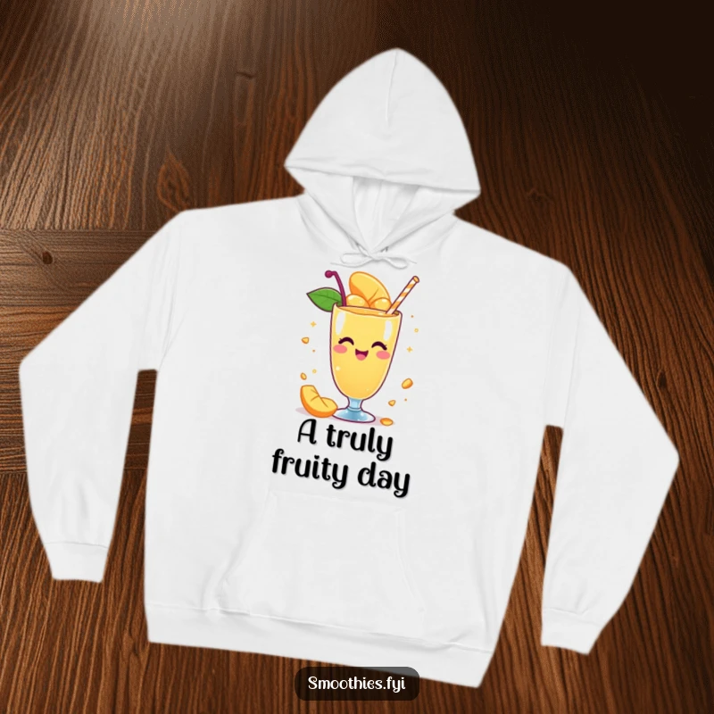 Funny hoodie with a whimsical mango smoothie character spinning with delight, offering cozy warmth and a touch of playful fun.